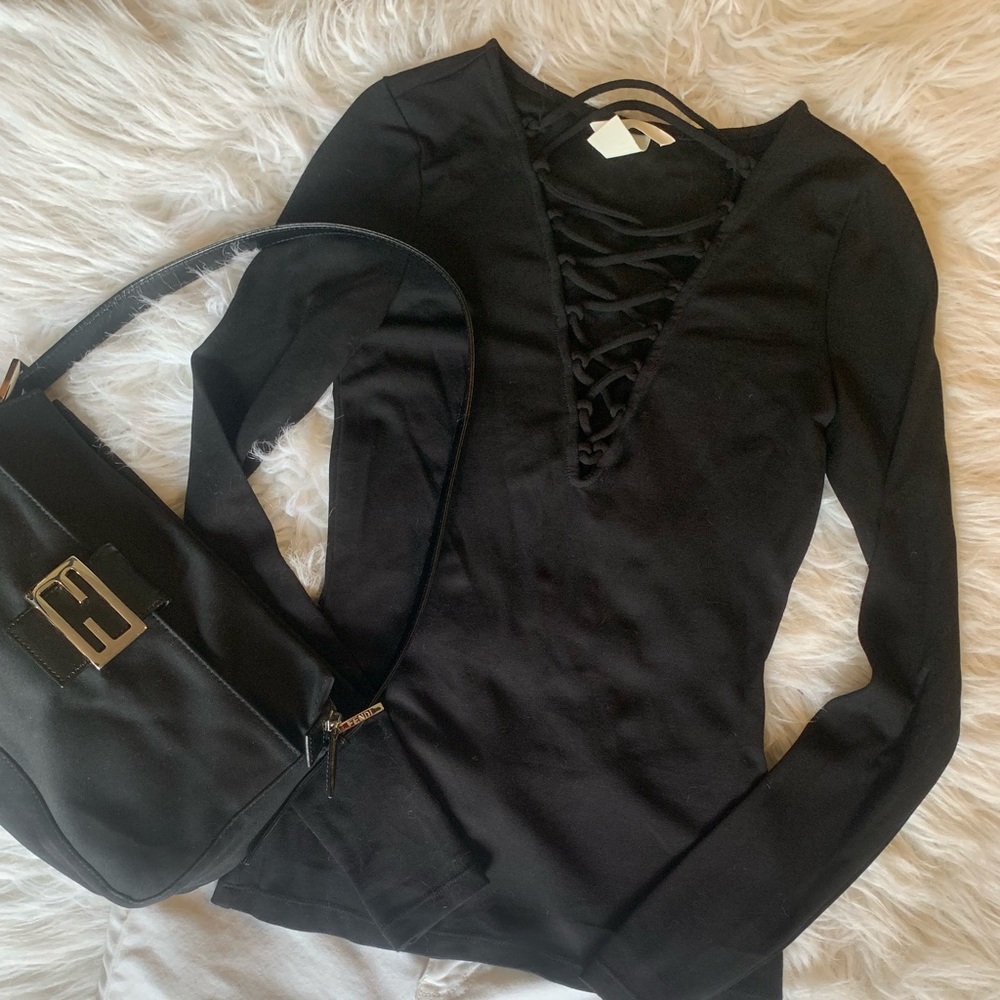Lace up fitted black top